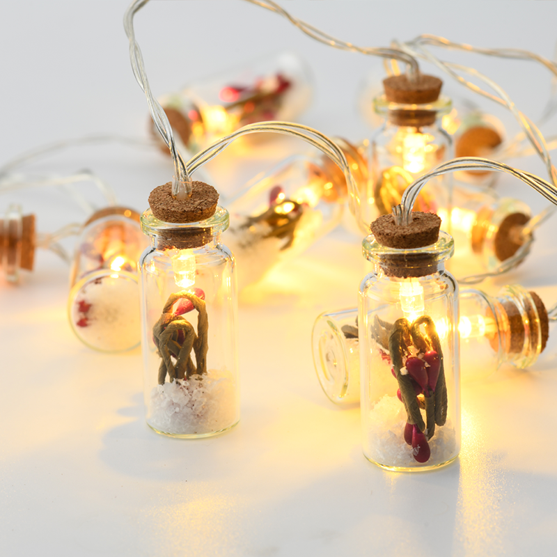 ACA LIGHTING CHRISTMAS XI10WW2A ”MINI GLASS BOTTLE" RED BERRY 10 LED STRING LIGHTS WITH BATTERIES (2xΑΑ) WARM WHITE IP20,135+30cm TRANSPARENT CABLE